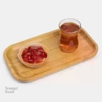 تارت توت فرنگی یک نفره جعبه بزرگ 1.200 الی 1.250 کیلوگرم (12 عدد)  - بیسکویت فنجانی مخصوص تارت -و کرم پاتیسیر و توت فرنگی و ژله ت...