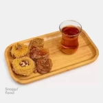 باقلوا استانبولی ۱ کیلوگرم - خمیر یوفکا باقوا، شهد شیر عسل، مغز پسته، تزیین شده با پودر پ...