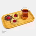 شیرینی آلمانی آجیلی 1 کیلوگرم (20 تا 25 عدد) - شیرینی دولایه و ترد، فیلینگ مربا، تزیین شده با انواع مغز