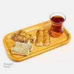 شیرینی ساق عروس ۱ کیلوگرم (50 تا 60 عدد) - خمیر مخصوص، کرمفیل، تزیین شده با پودر پسته، پودر گردو و کنجد...