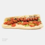 ساندویچ کوکتل - 3 عدد کوکتل 70% گوشت، کاهو، گوجه، خیارشور، نان باگت
